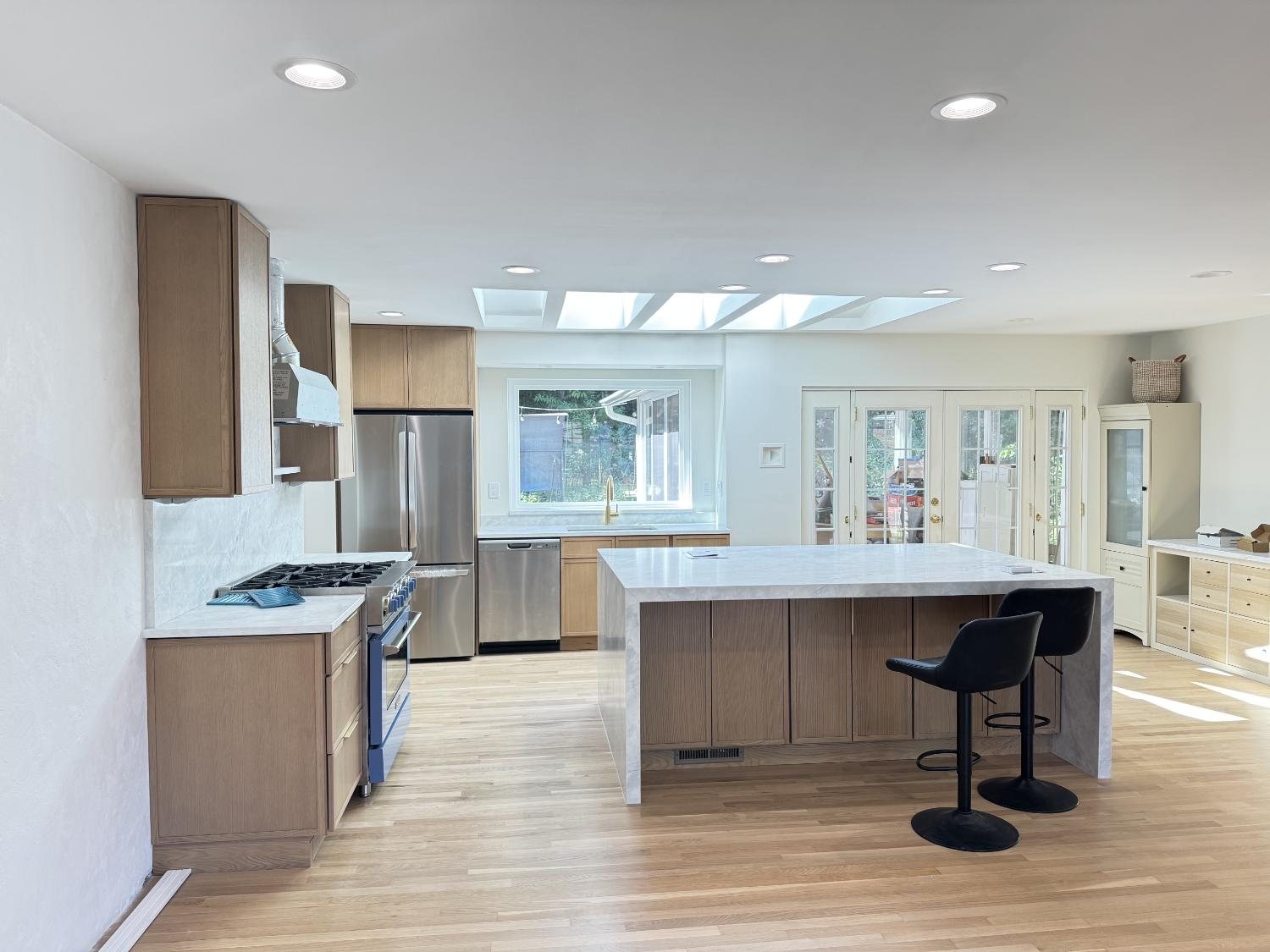 Finished oak kitchen by NK Contracting Group